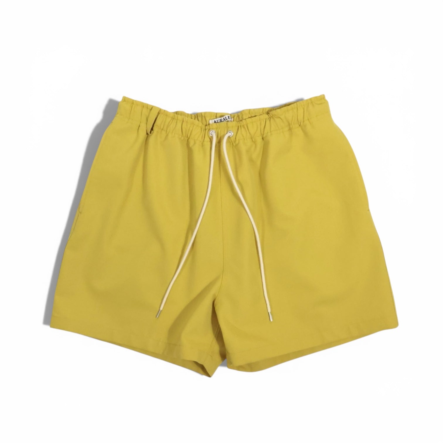 AURALEE 「WOOL MAX CANVAS SHORTS / MUSTARD YELLOW」 – SISTER