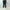 AURALEE 「BLUEFACED WOOL TWO-TUCK SLACKS / CHARCOAL NAVY STRIPE」