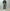 AURALEE 「BLUEFACED WOOL TWO-TUCK SLACKS / KHAKI GRAY STRIPE」