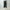 AURALEE「ULTRA FINE TROPICAL WOOL TWO-TUCK SLACKS / TOP CHARCOAL」