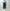 AURALEE「ULTRA FINE TROPICAL WOOL TWO-TUCK SLACKS / TOP CHARCOAL」