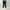 AURALEE 「LIGHT WOOL MAX GABARDINE TWO-TUCK SLACKS / TOP BLACK」