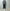AURALEE「LOW-GAUGE HOMESPUN TWEED KNIT ZIP TURTLE / TOP CHARCOAL」