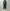 AURALEE「REVERSIBLE WOOL TWISTED TWILL / SHEEP LEATHER HALF COAT - BROWN CHAMBRAY × BLACK」