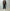 AURALEE「REVERSIBLE WOOL TWISTED TWILL / SHEEP LEATHER HALF COAT - BROWN CHAMBRAY × BLACK」