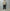 AURALEE「REVERSIBLE WOOL TWISTED TWILL / SHEEP LEATHER HALF COAT - KHAKI BEIGE CHAMBRAY × BLACK」