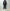 AURALEE「REVERSIBLE WOOL TWISTED TWILL / SHEEP LEATHER HALF COAT - KHAKI BEIGE CHAMBRAY × BLACK」